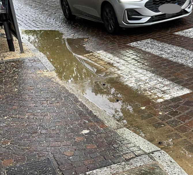 Piazza Roma pozzanghera